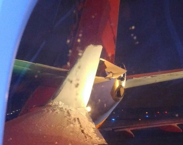 2016-02-17 AA B738 and WN B737 planes in ground collision at Detroit